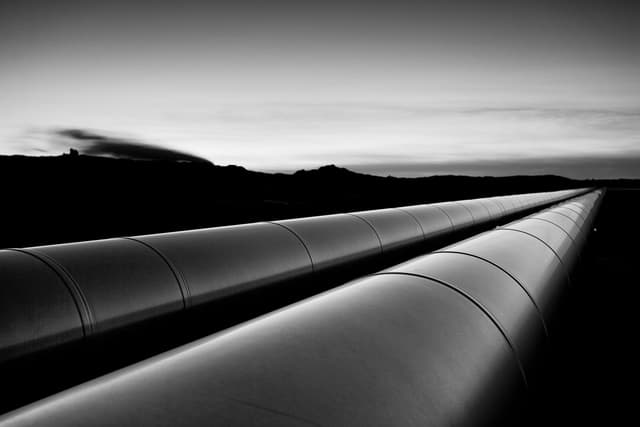 Two pipelines disappearing into the distance