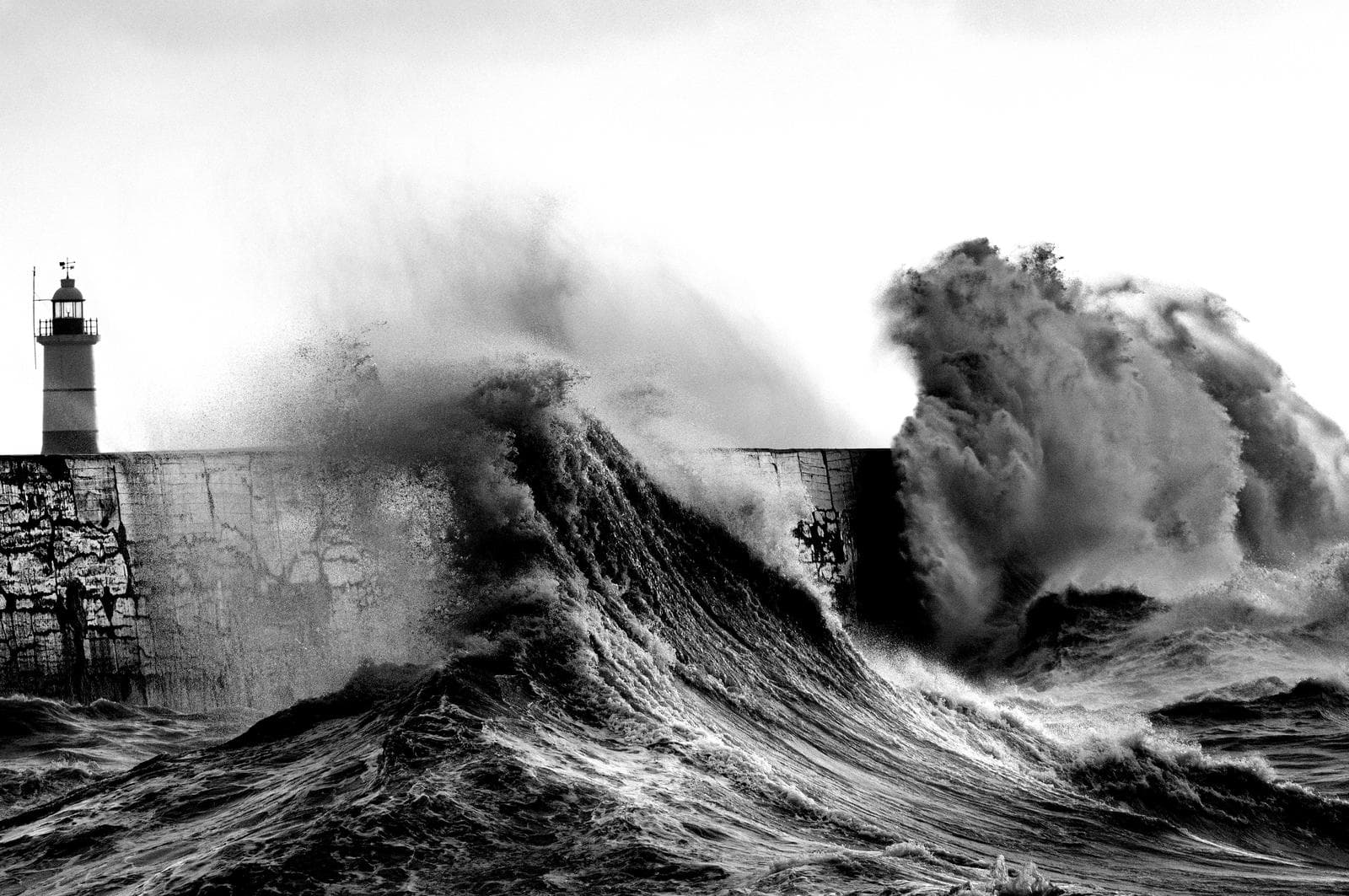 Waves hit breakwater during storm