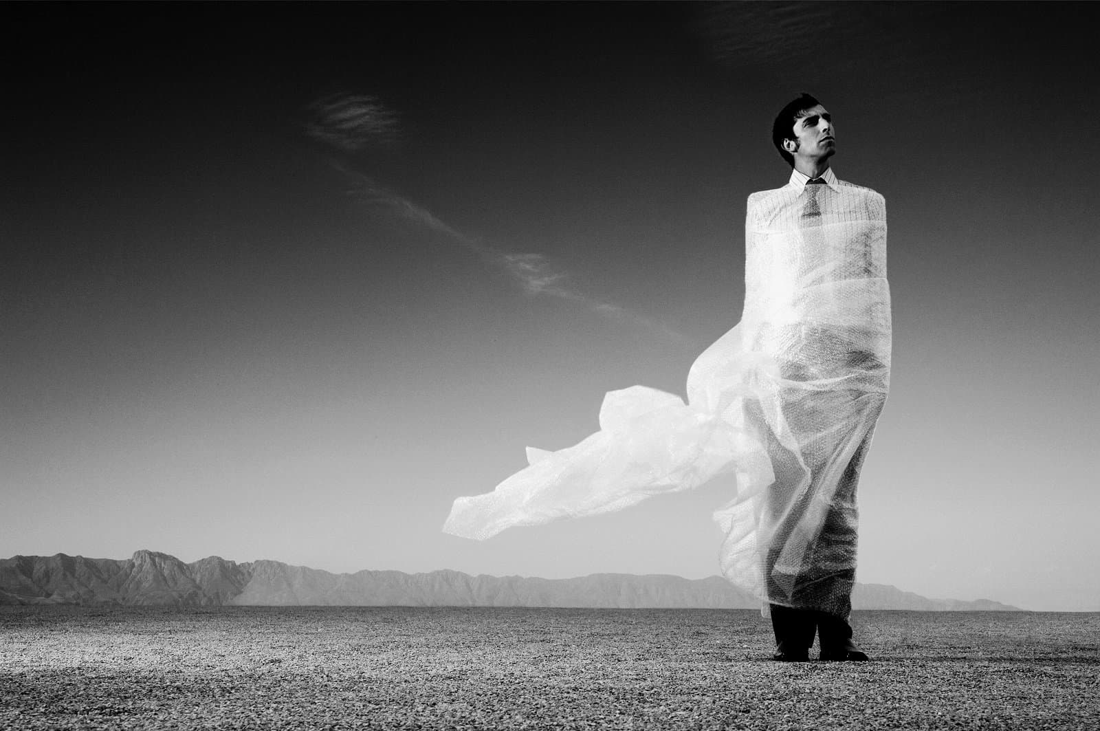 Man in suit in the desert