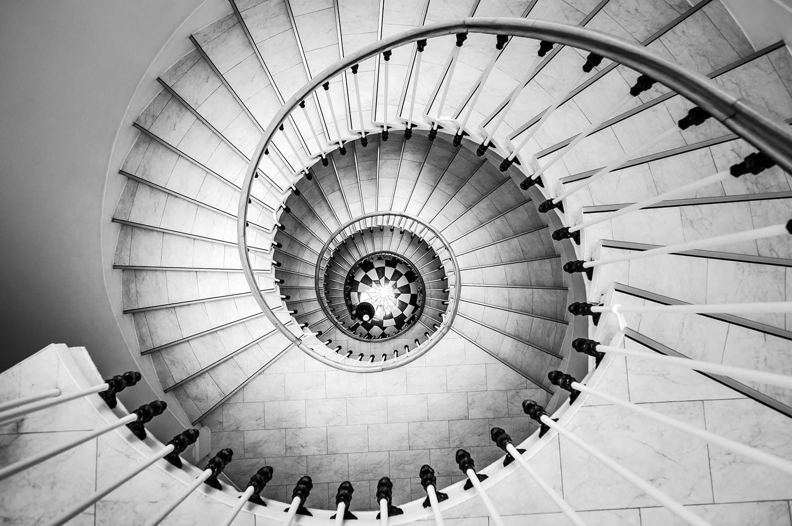 Birds eye view of a tall spiral staircase